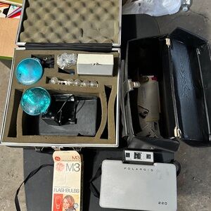 Polaroid Camera with Red and Silver Accents